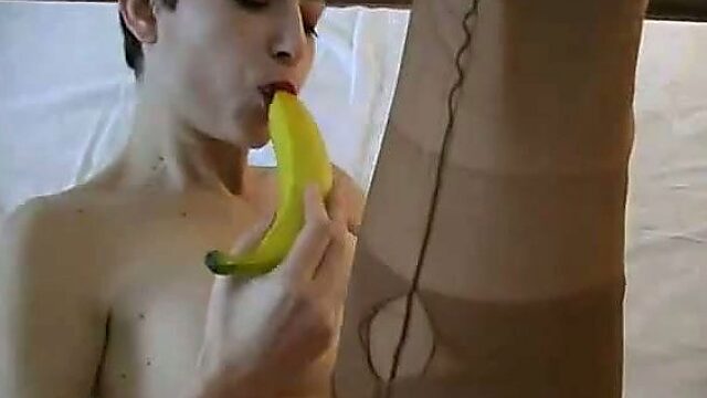 Shor-haired brunette whore fucks her pussy with banana