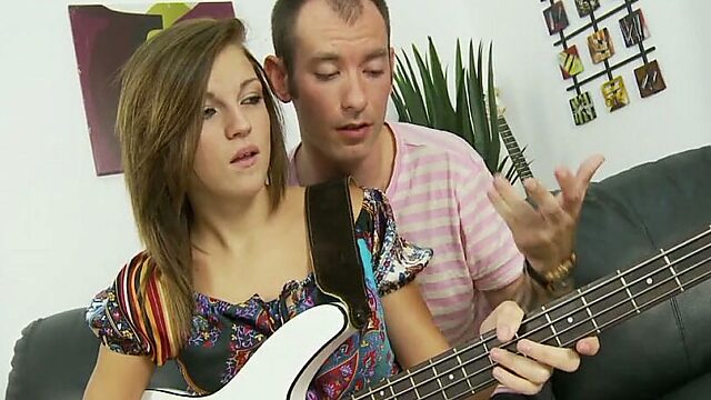 Young brunette is making love with her guitar teacher