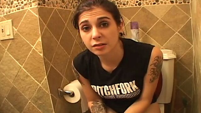 Slutty amateur brunette girlie is caught pissing in the toilet