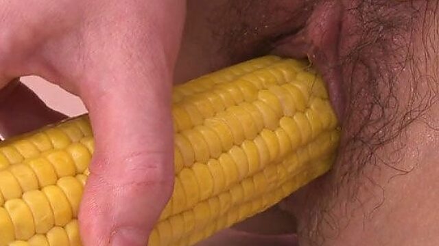 Weird pale Japanese wanker Naomi Sugawara fucks her twat with corn