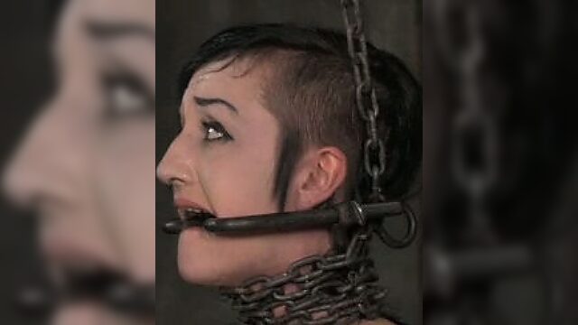 Master fucks her throat with big sex toy in the torture room