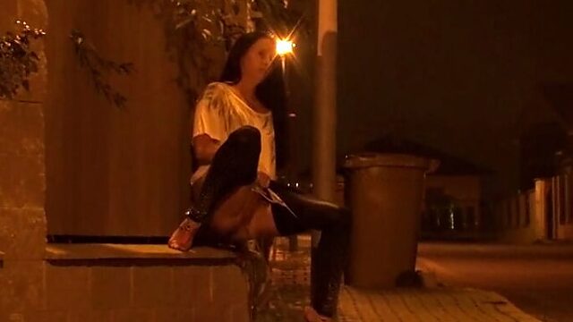 Black haired torrid beauty pisses outdoors late at night