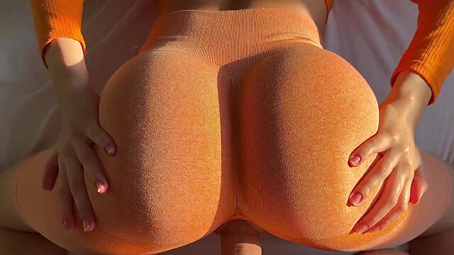 Sporty chick gets her wet pussy pounded through tight shorts