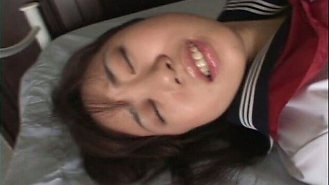 Delicious Japanese teen Ryoko Yaka masturbating in bed